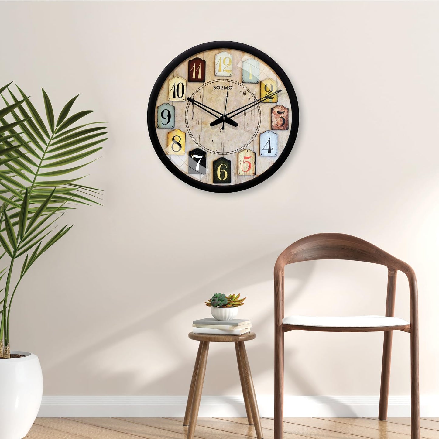 Amazon Brand - Solimo 12-Inch Contemporary Plastic&Glass Analog Wall Clock-Designer(Silent Movement,Black Frame)